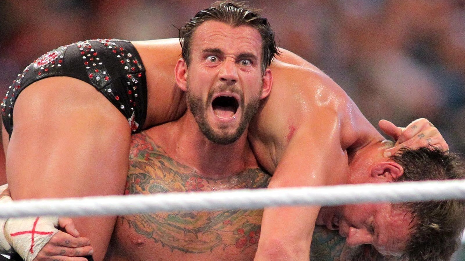 CM Punk, seen competing against Chris Jericho at Wrestlemania, was part of a WWE scandal