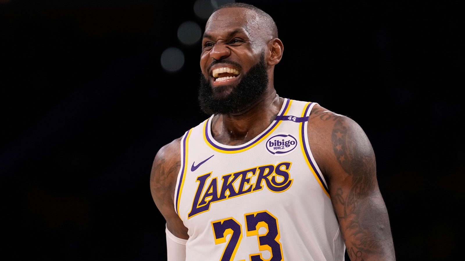 Los Angeles Lakers forward LeBron James smiles during the second half in Game 1 of an NBA first-round playoff series against the Minnesota Timberwolves