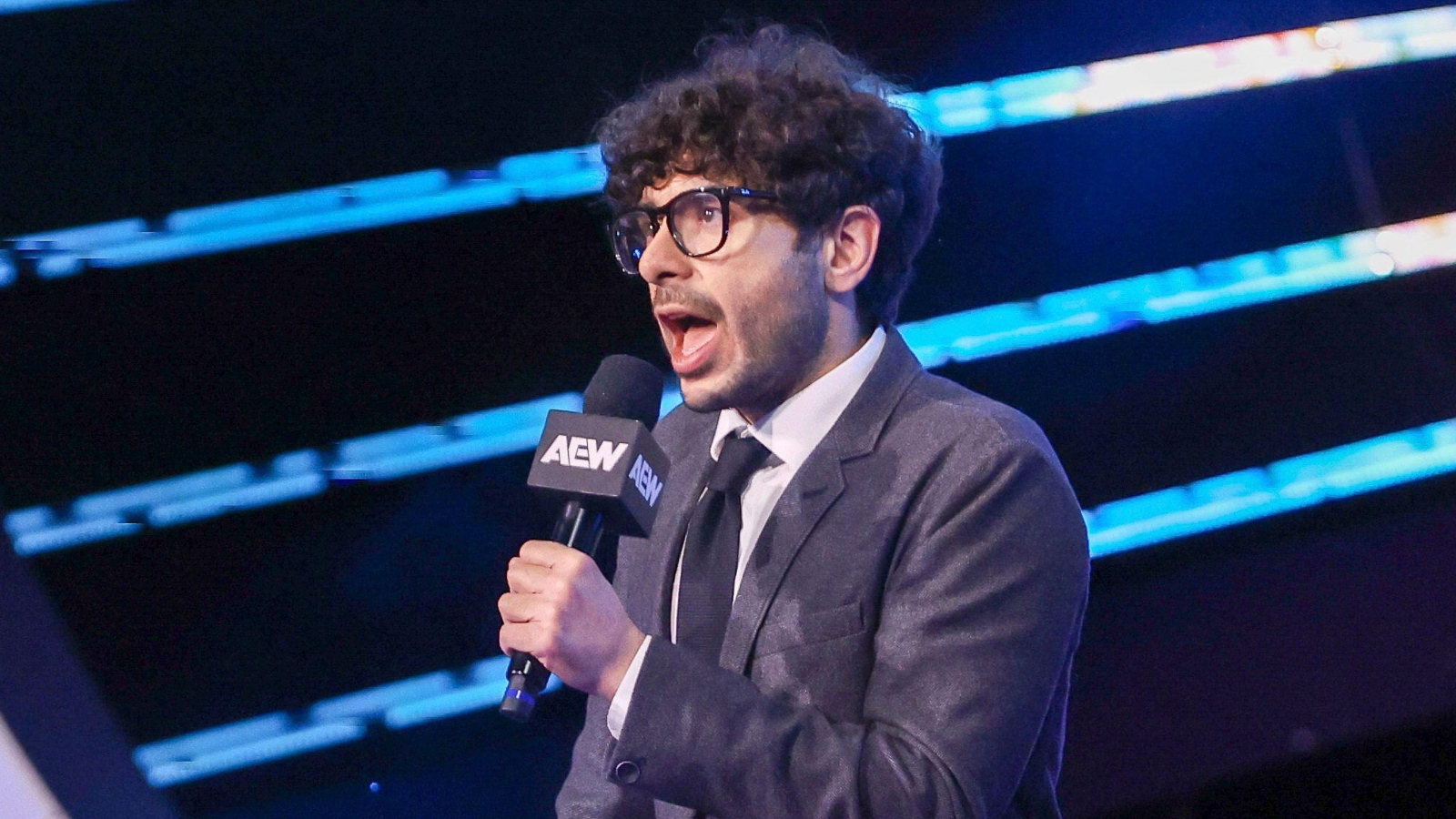 TONY KHAN GIFTS AEW CHAMPION SOCCER JERSEY SIGNED BY PREMIER LEAGUE ICON