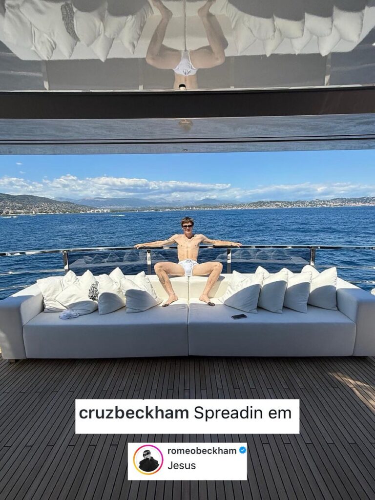 Cruz Beckham spreads his legs and mimicks David Beckham pose