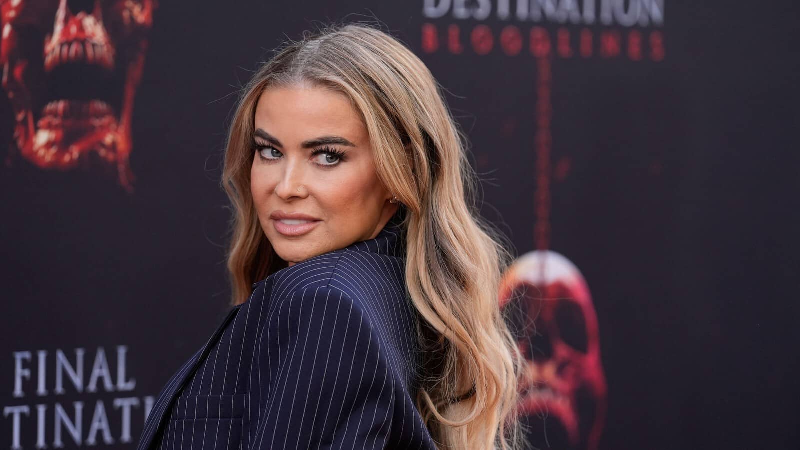 53Y/O ONLYFANS MODEL CARMEN ELECTRA POSTS SERIES OF RAUNCHY PICS WITH BUTTCHEEKS ON SHOW